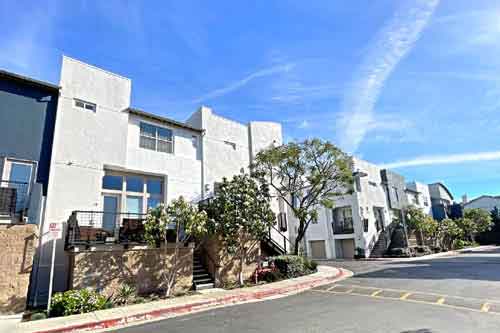 gated community of Fusion South Bay townhomes and condos